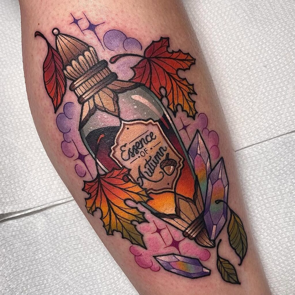 tatuaj cu potiune de vrajitoare de toamna cu frunze si culori